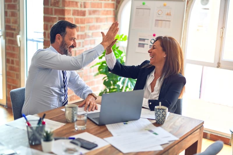Professional financial advisor meeting with clients